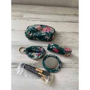 Small zippered green floral bag with matching key chain/change purse, lipstick